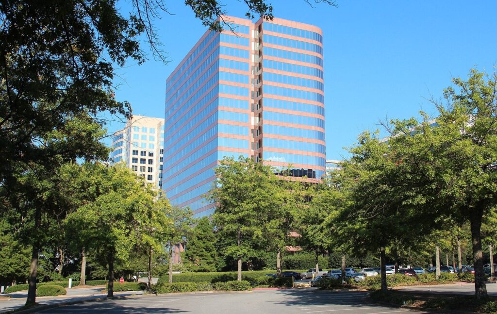 Office tower against blue sky