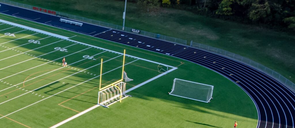 Football turf field with painted yard lines